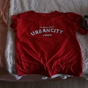 bright red "UrbanCity" tee